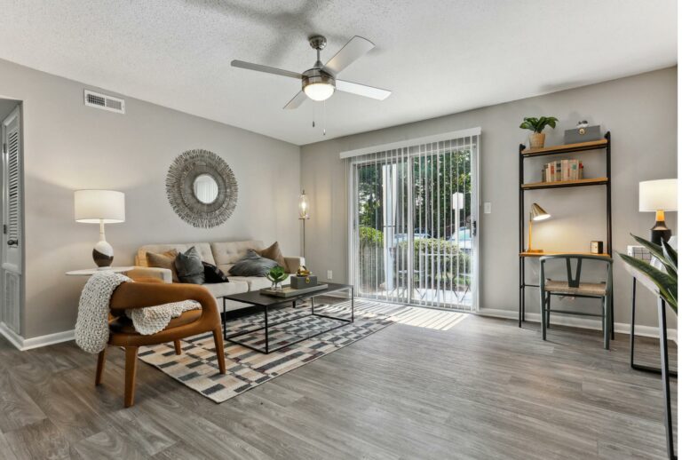 living room leading to private patio