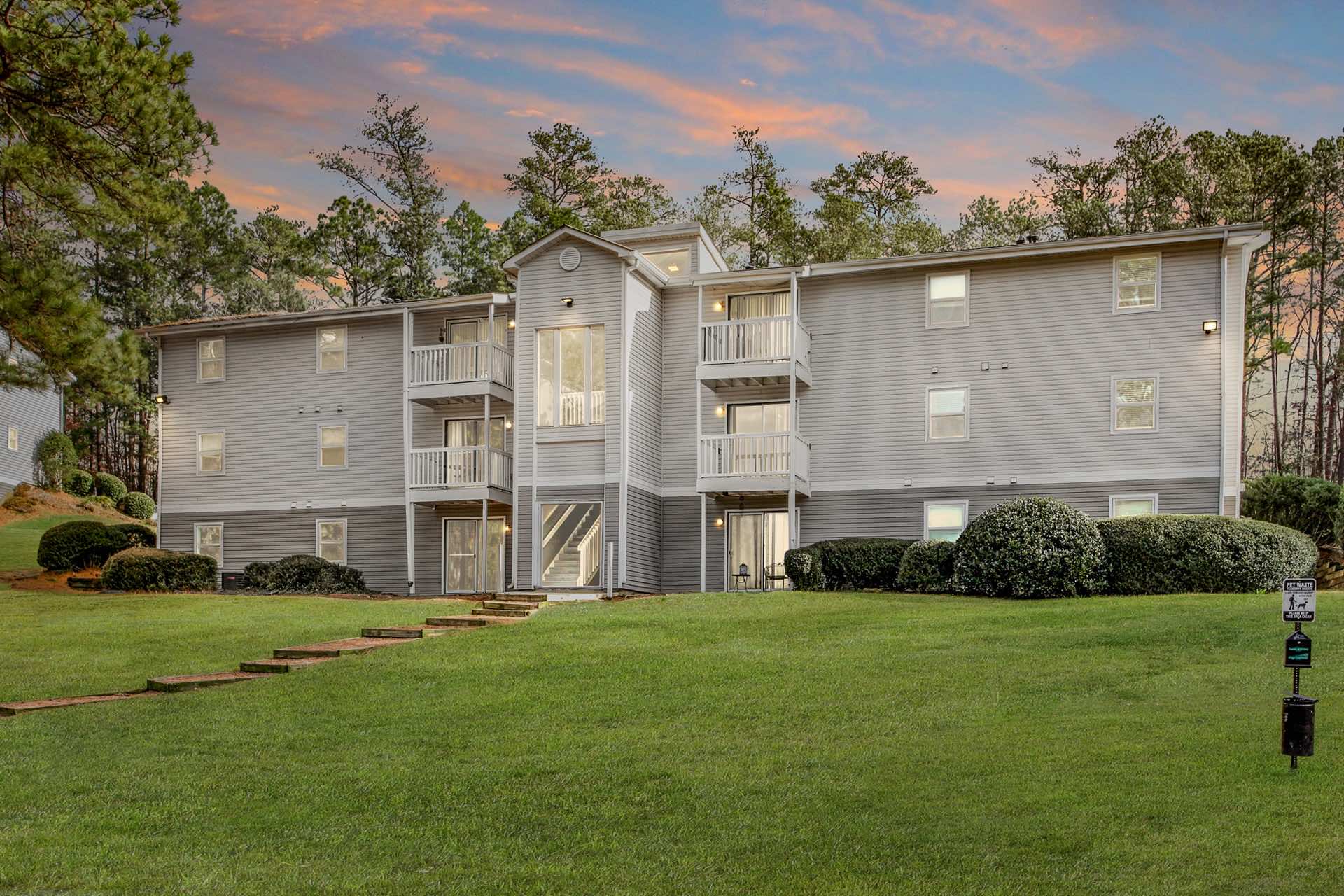 exterior view of apartment building at dusk