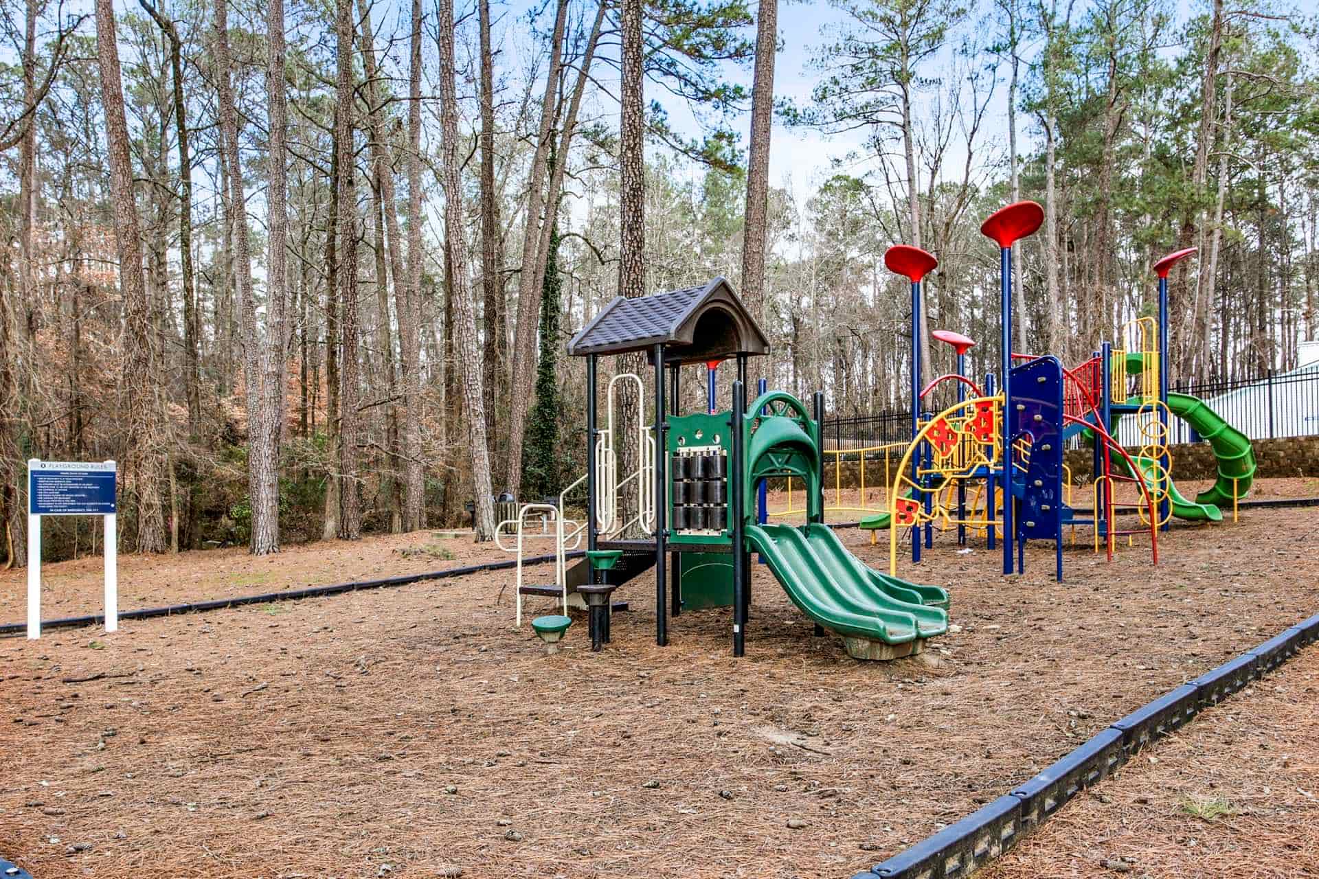 playground in area with trees