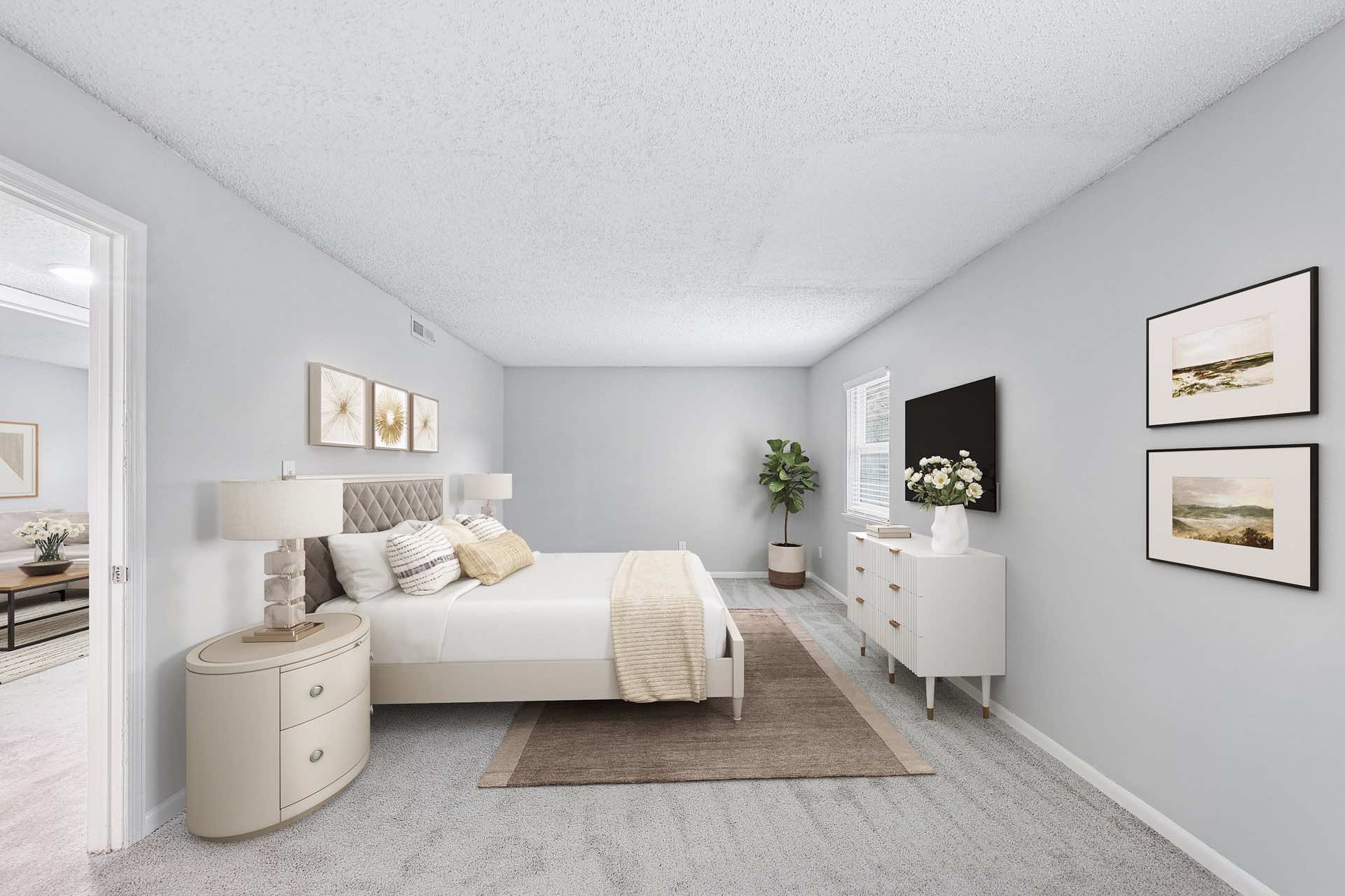 bedroom with natural lighting and plush carpeting